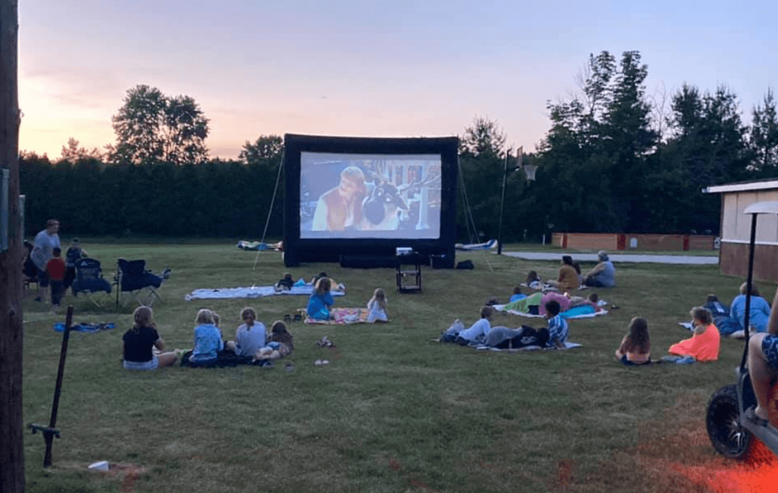 Outdoor movie night under the stars at Country Acres